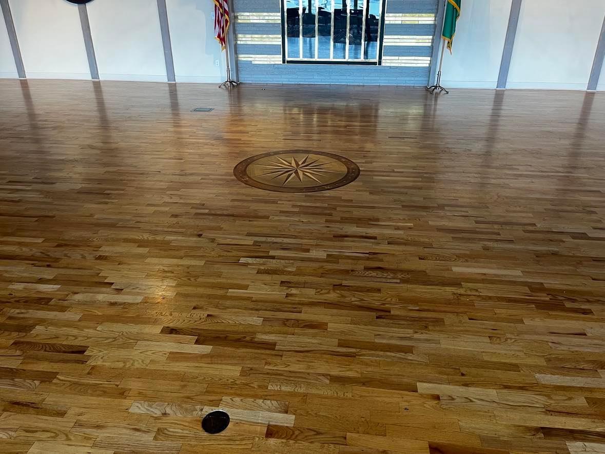 yacht club flooring with custom compass design